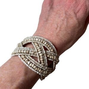 Clam Shell Beaded Braided Bracelet With All Natural Stones.